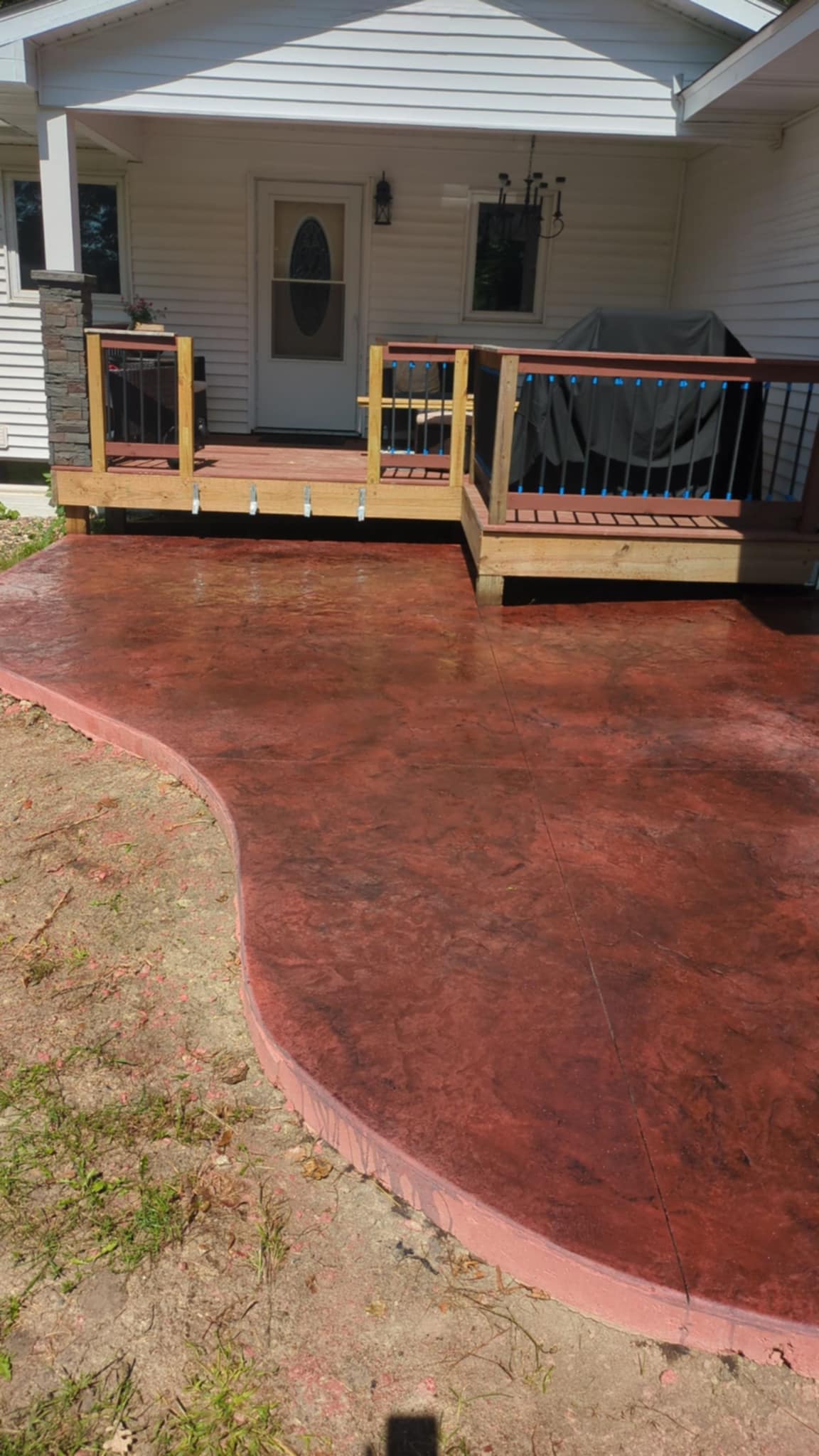 Red Colored Stamped Concrete Walkway